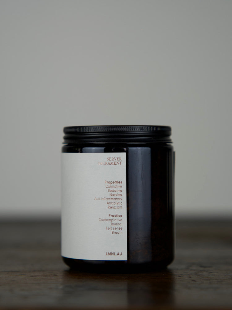 
                  
                    Herbal Tea in an amber glass jar with a matte black lid
                  
                