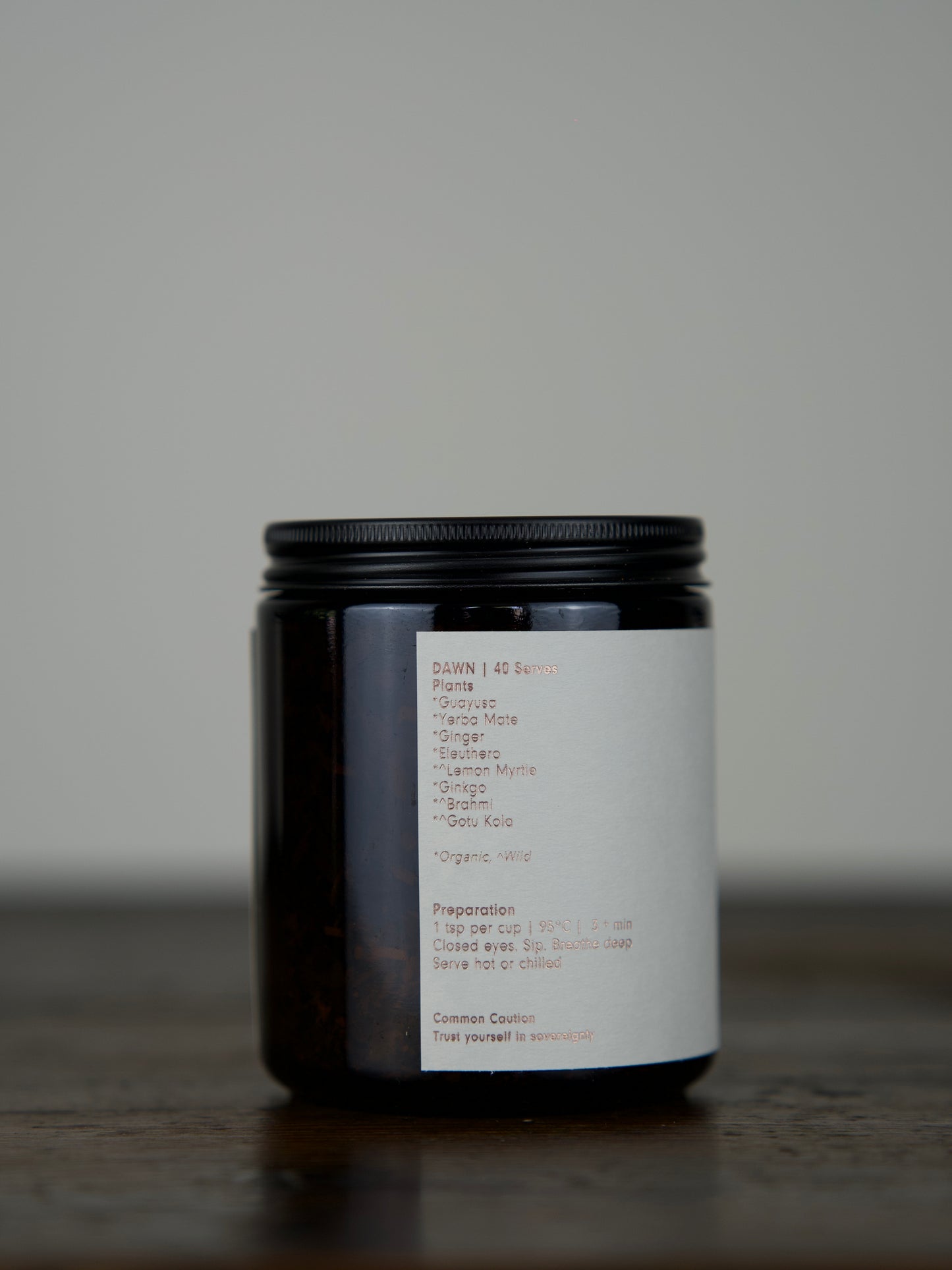 
                  
                    Herbal Tea in an amber glass jar with a matte black lid
                  
                